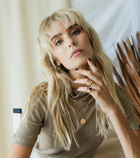 Black scarab pinky ring gold